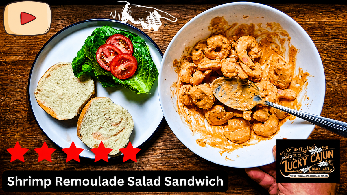 SAhrimp remoulade salad sandwich with lettuce tomato and roll
