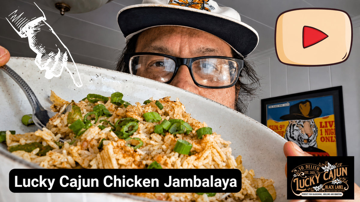 Chicken jambalaya made with Lucky Cajun Black Beard's Smoke fresh ground Cajun seasoning showing dark roux chicken thighs holy trinity vegetables and basmati rice in a cast iron Dutch oven