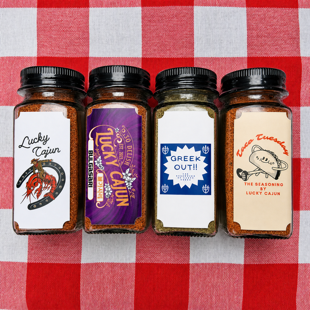 Premium glass jar 4-pack of fresh-ground Bulgasari and Cajun seasonings. A refillable, sugar-free gift option to replace stale warehouse dust.