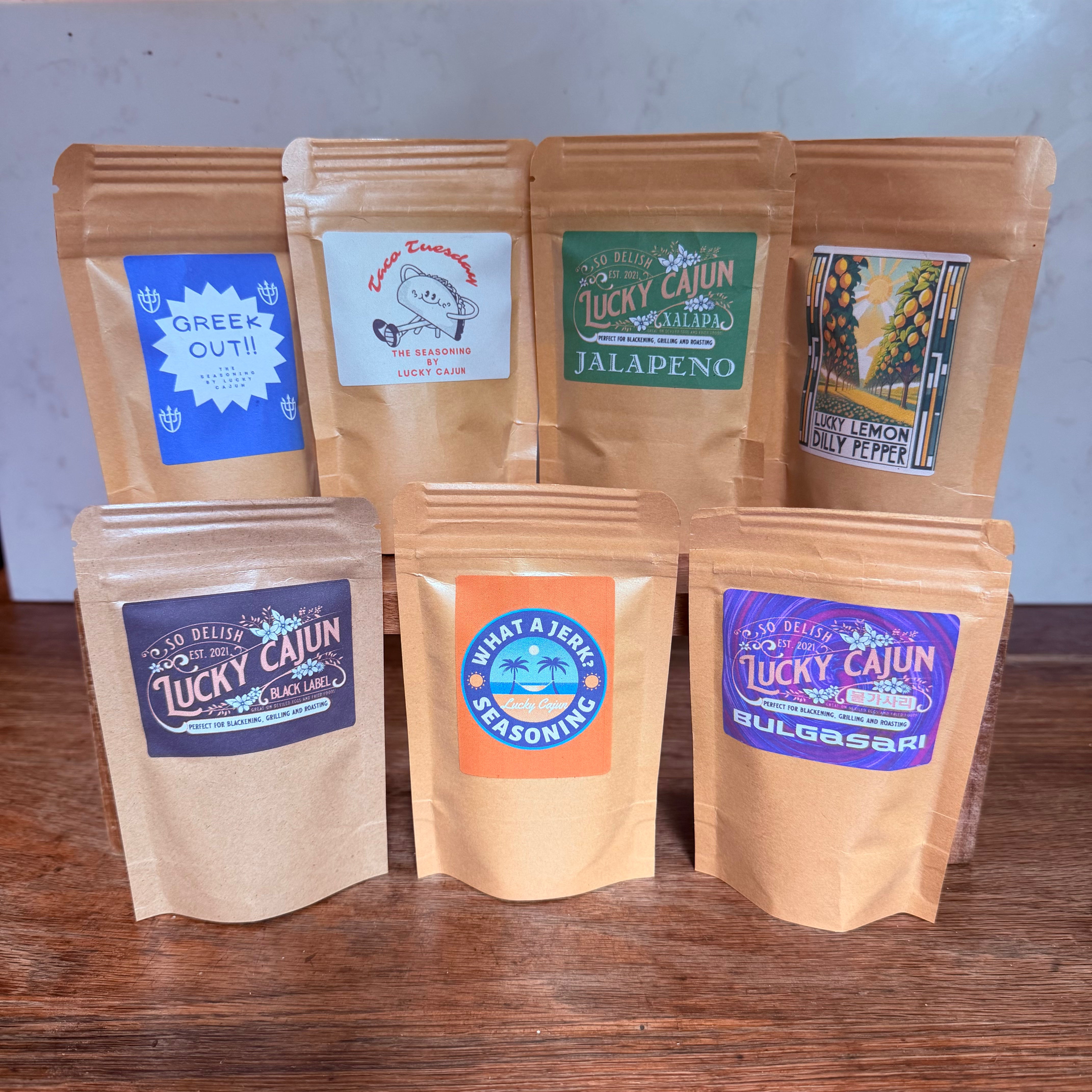 Lucky Cajun 7-blend fresh-ground chicken seasoning bundle — Greek Out, Taco Tuesday, Jalapeño, Lemon Dilly Pepper, Black Label, What A Jerk, Bulgasari