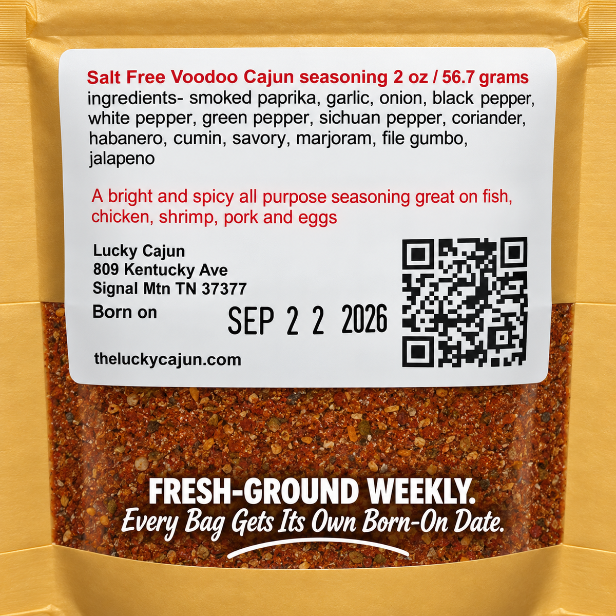 Salt Free Voodoo Cajun seasoning in a 2 oz pouch, featuring a white label with red text and a QR code, with the seasoning visible through clear windows in the gold pouch.