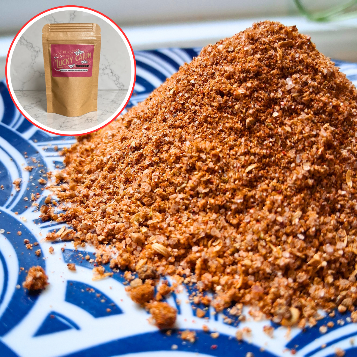 Fresh-ground Voodoo spicy Cajun seasoning piled on a plate, a habanero-spiked blend with deep red chili color