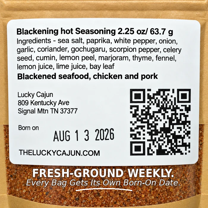 Close-up of a spice seasoning bag label reading 'Blackening hot Seasoning 2.25 oz / 63.